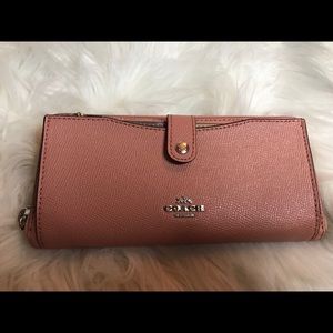 Pink/ Salmon Coach Wallet. Never been used.